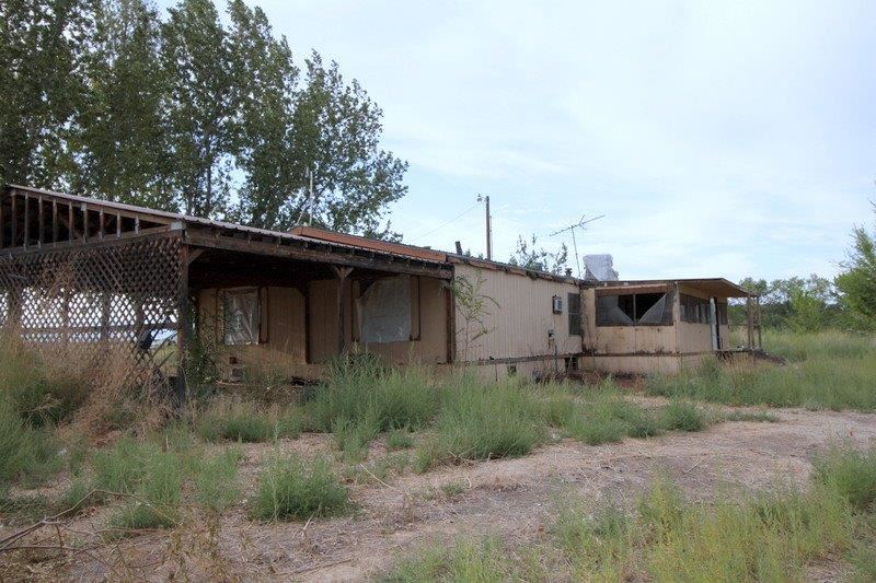 1075 Q Road Mack, CO 81525 - Photo 12 of 17 a backyard of a house with lots of green space