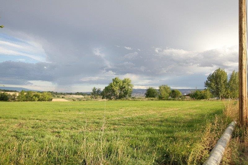 1075 Q Road Mack, CO 81525 - Photo 17 of 17 a view of an ocean and a yard