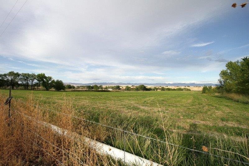1075 Q Road Mack, CO 81525 - Photo 2 of 17 a view of a lake from a yard