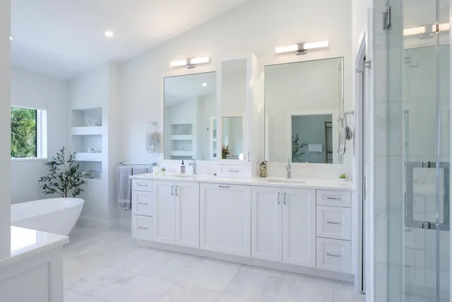 a bedroom with furniture and a flat screen tv