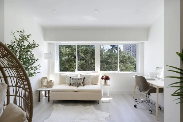 a bathroom view of a toilet and a sink
