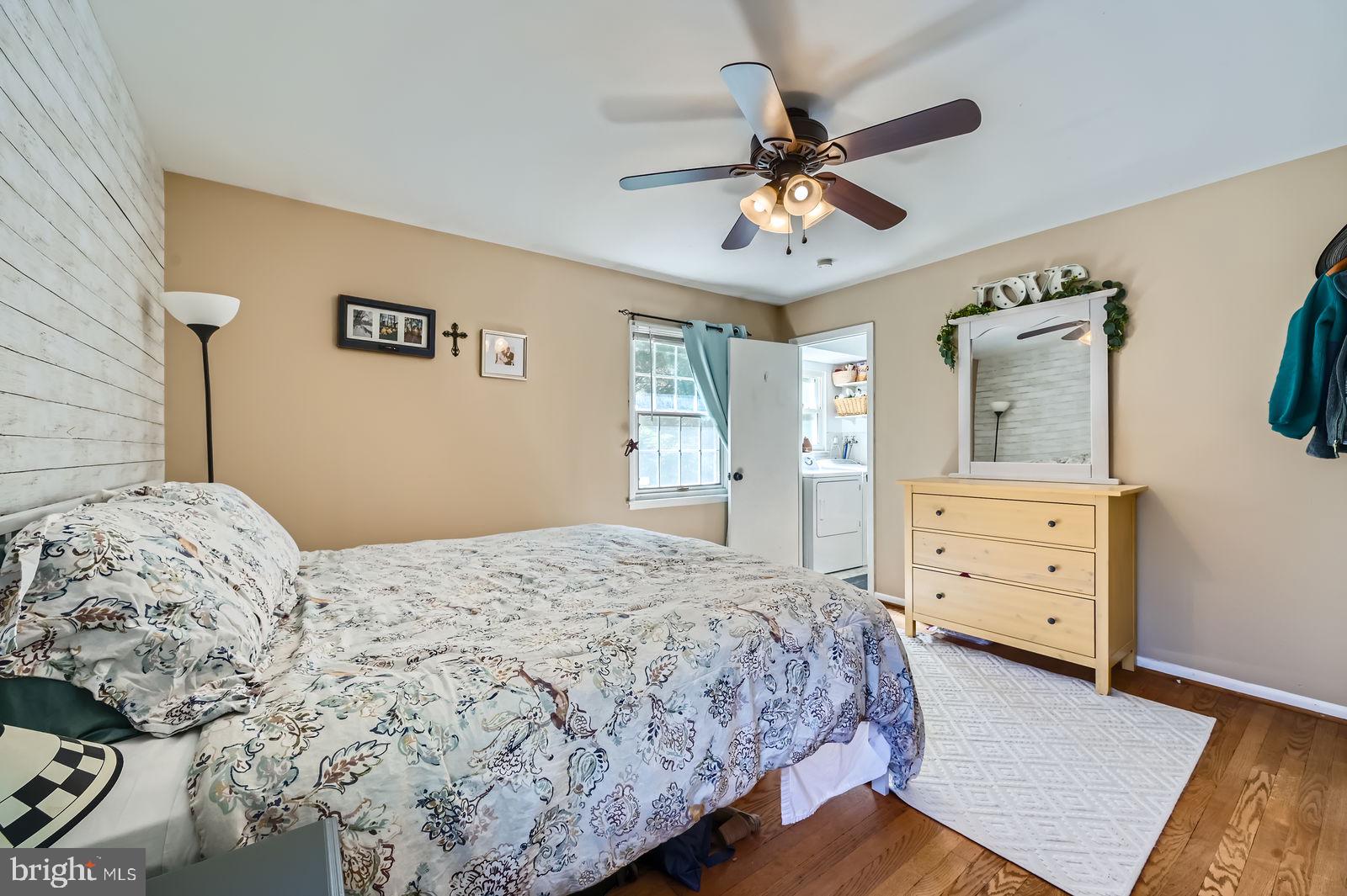 14629 Hanover Pike Upperco, MD 21155 - Photo 16 of 38 a bedroom with a bed and a dresser