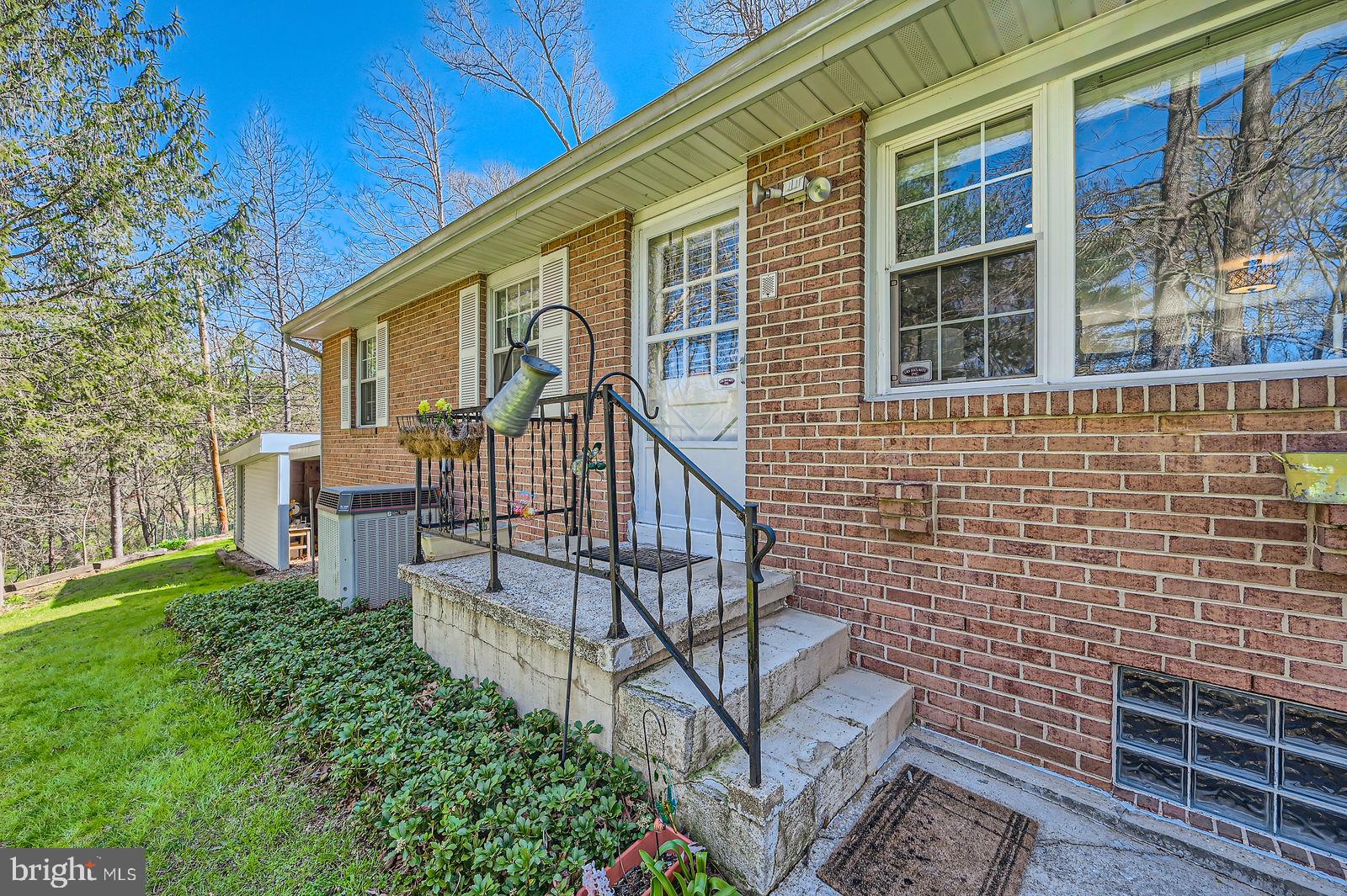 14629 Hanover Pike Upperco, MD 21155 - Photo 26 of 38 a view of a house with backyard and porch