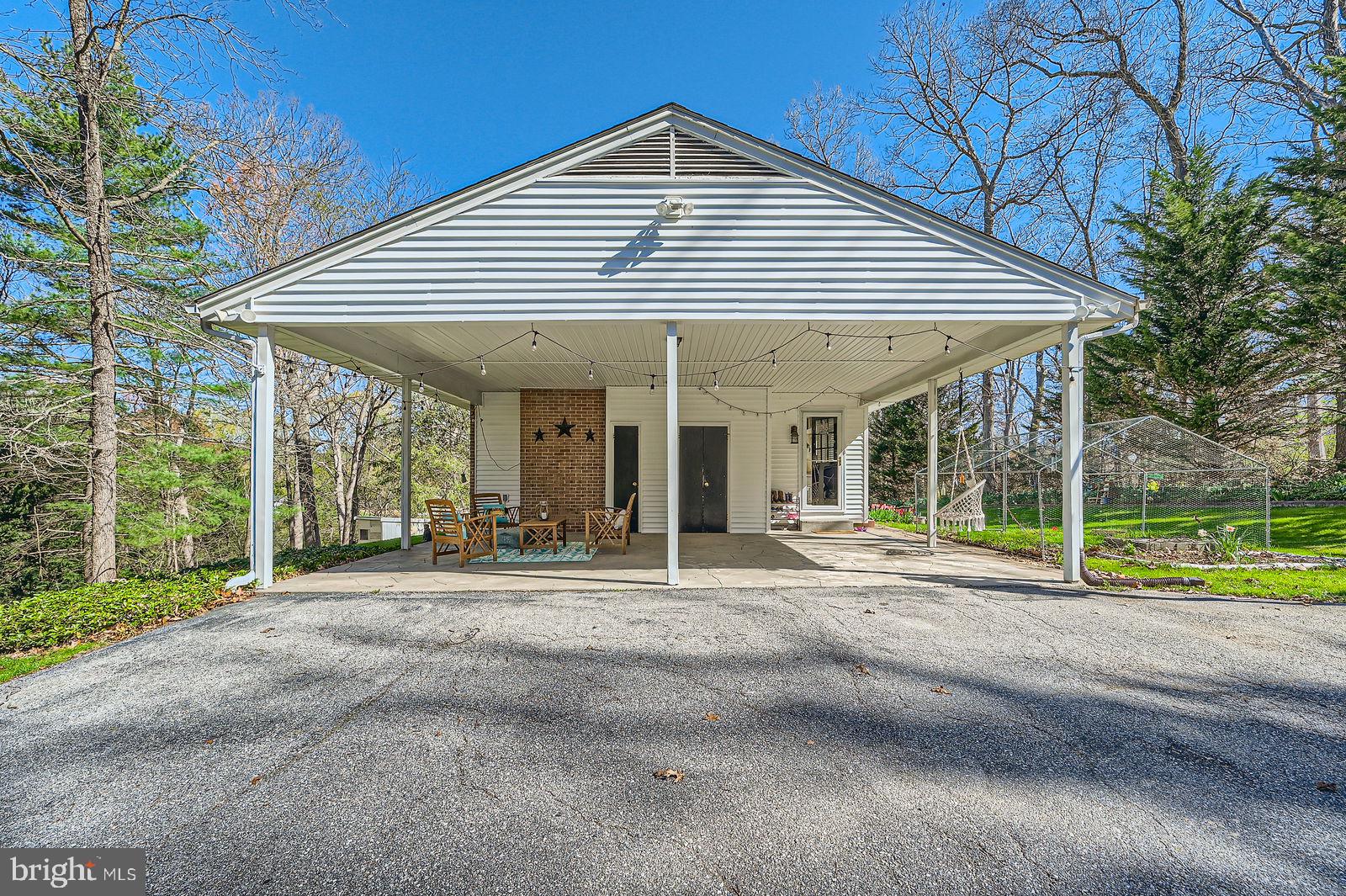 14629 Hanover Pike Upperco, MD 21155 - Photo 27 of 38 a view of a house with a yard and porch