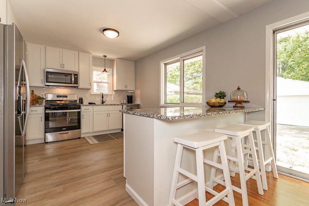 32609 Knobel Road Willowick, OH 44095 - Photo 6 of 29 Updated kitchen with eat- in kitchen/island area