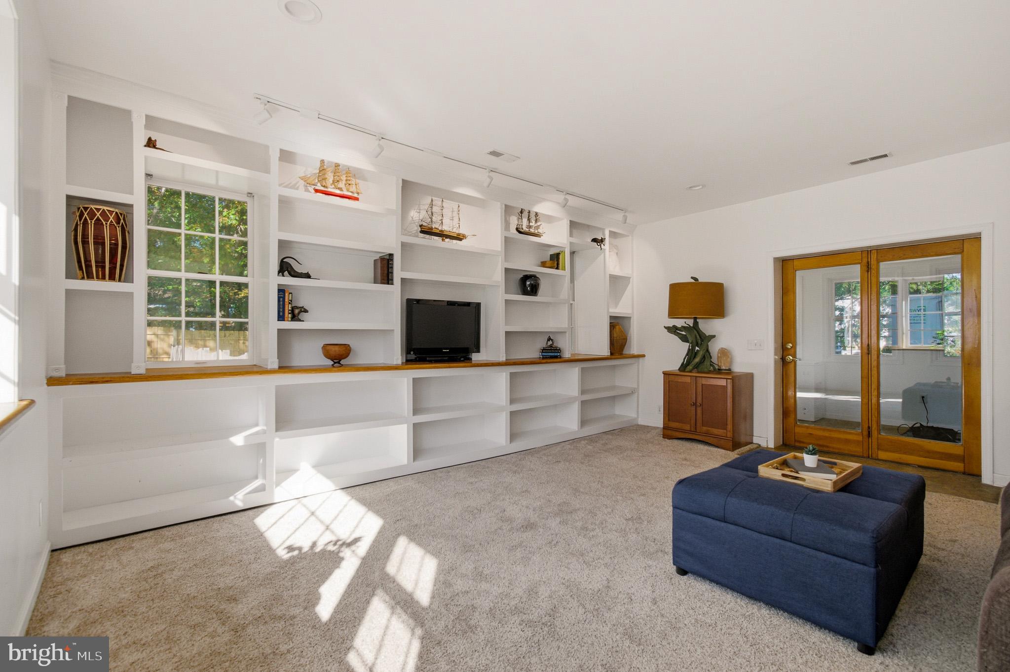 1016 Carrs Road Annapolis, MD 21403 - Photo 14 of 42 a living room with furniture and a flat screen tv