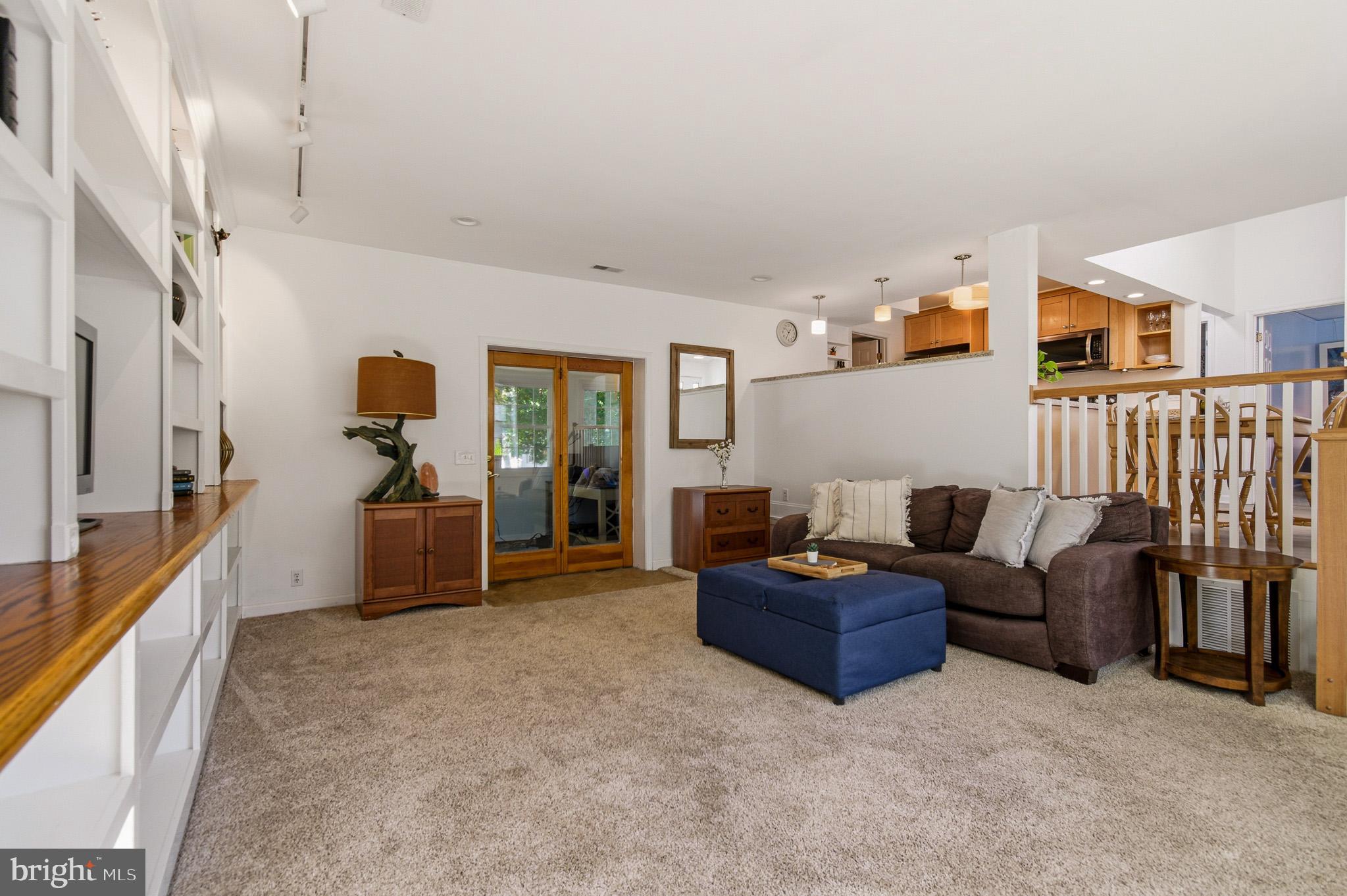 1016 Carrs Road Annapolis, MD 21403 - Photo 15 of 42 a living room with furniture and a flat screen tv