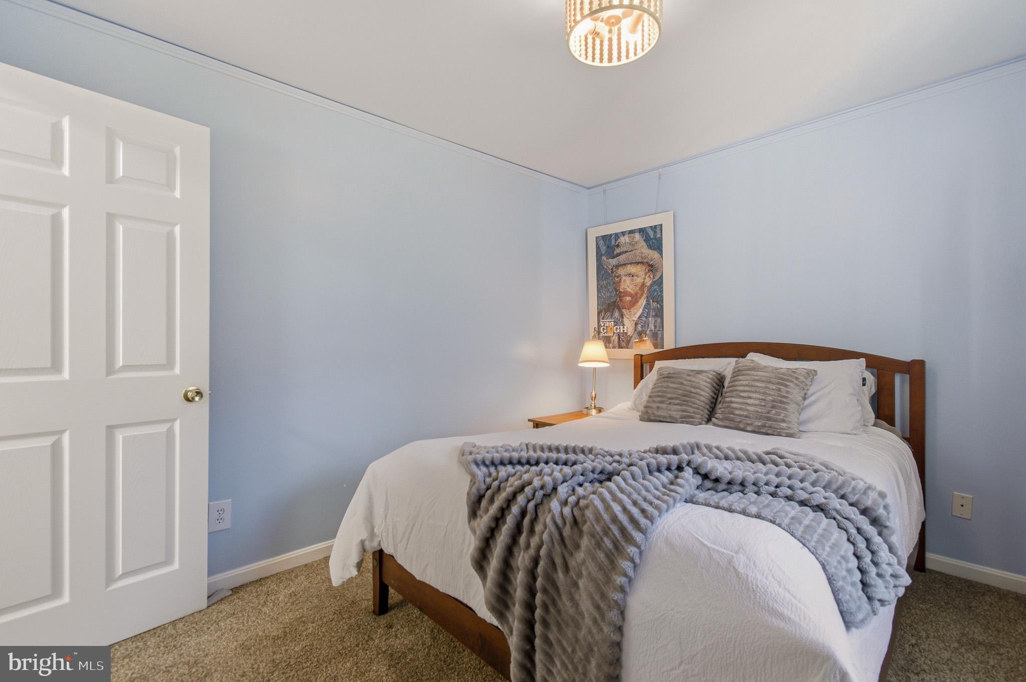 1016 Carrs Road Annapolis, MD 21403 - Photo 23 of 42 a bedroom with a bed and a window