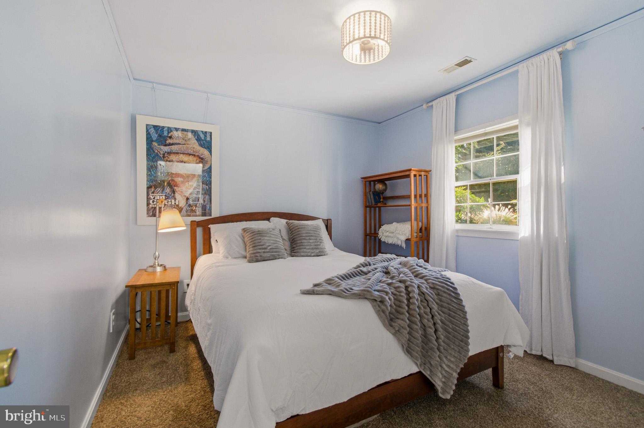 1016 Carrs Road Annapolis, MD 21403 - Photo 25 of 42 a bedroom with a bed and a window