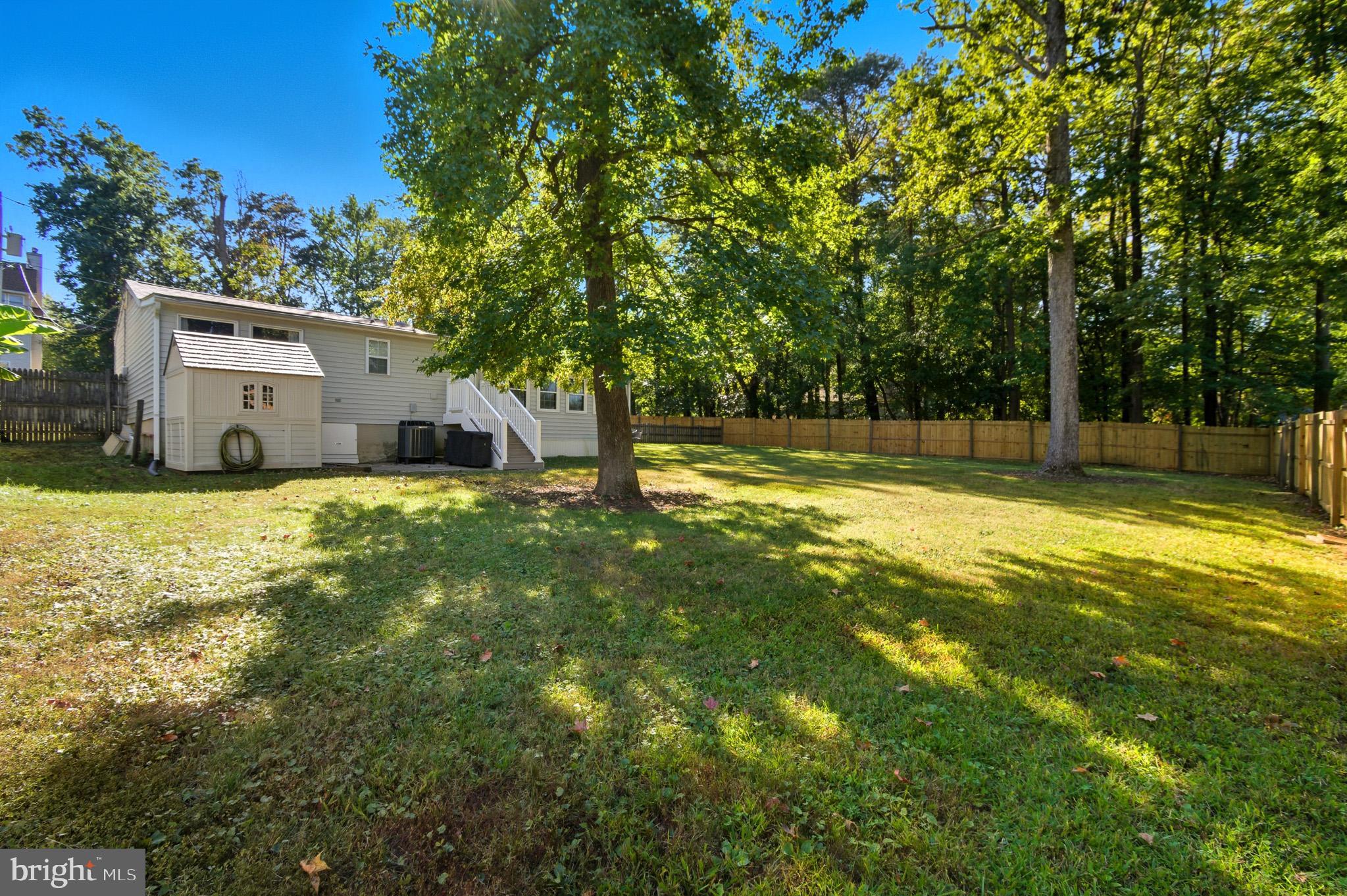 1016 Carrs Road Annapolis, MD 21403 - Photo 34 of 42 a view of a back yard with a house and a small yard
