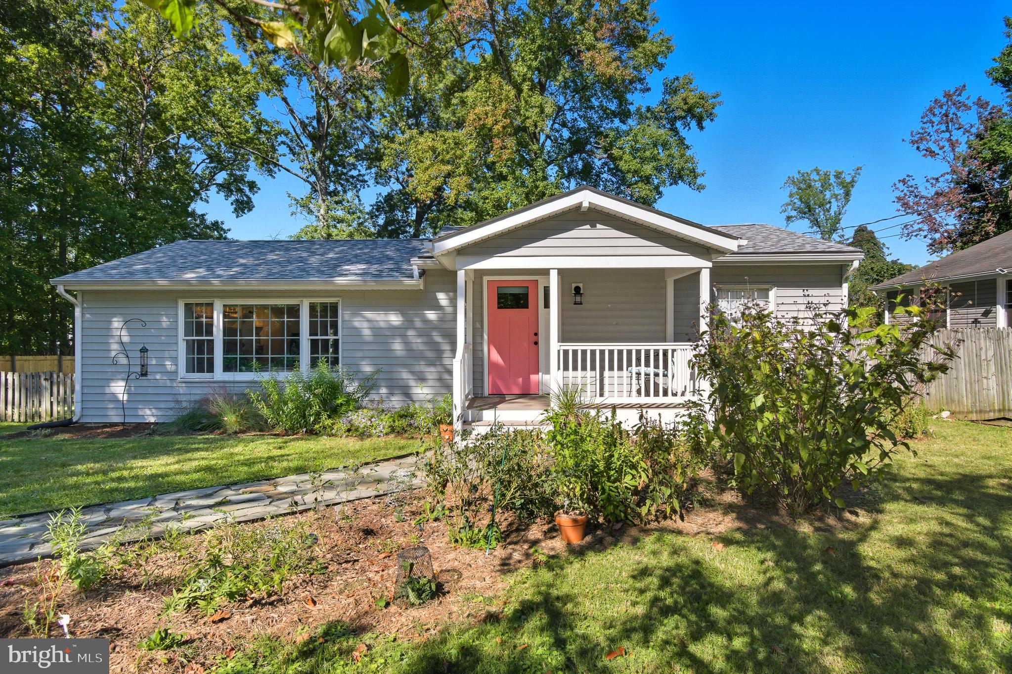 1016 Carrs Road Annapolis, MD 21403 - Photo 40 of 42 a front view of a house with a garden