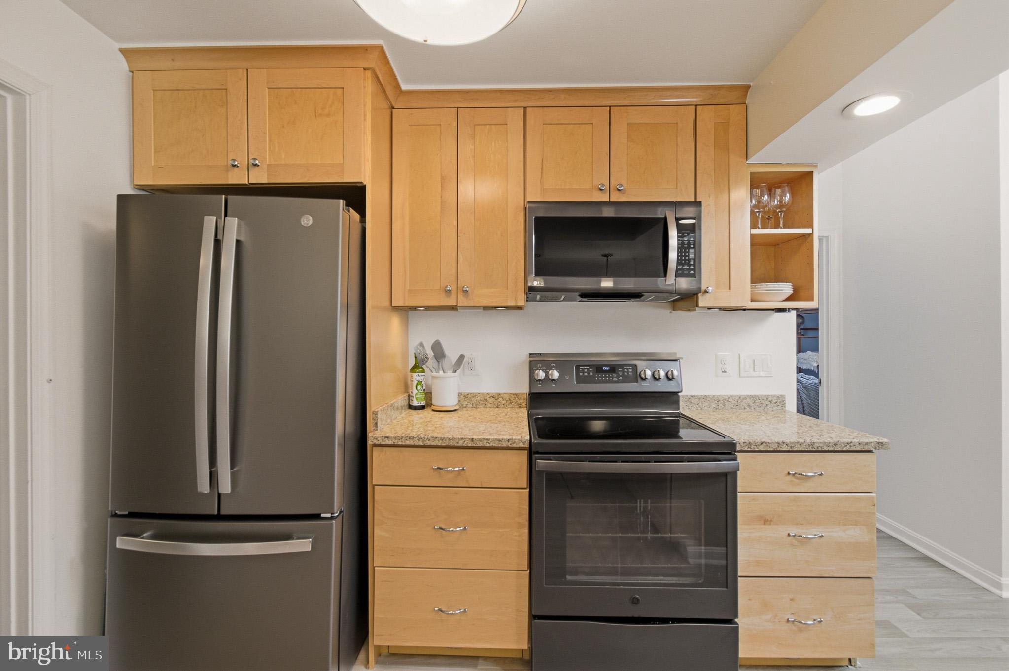 1016 Carrs Road Annapolis, MD 21403 - Photo 9 of 42 a kitchen with a refrigerator stove and microwave
