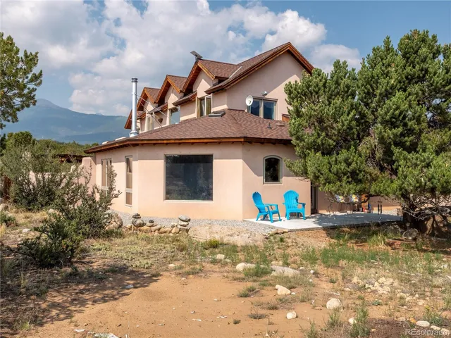 a view of house with outdoor space
