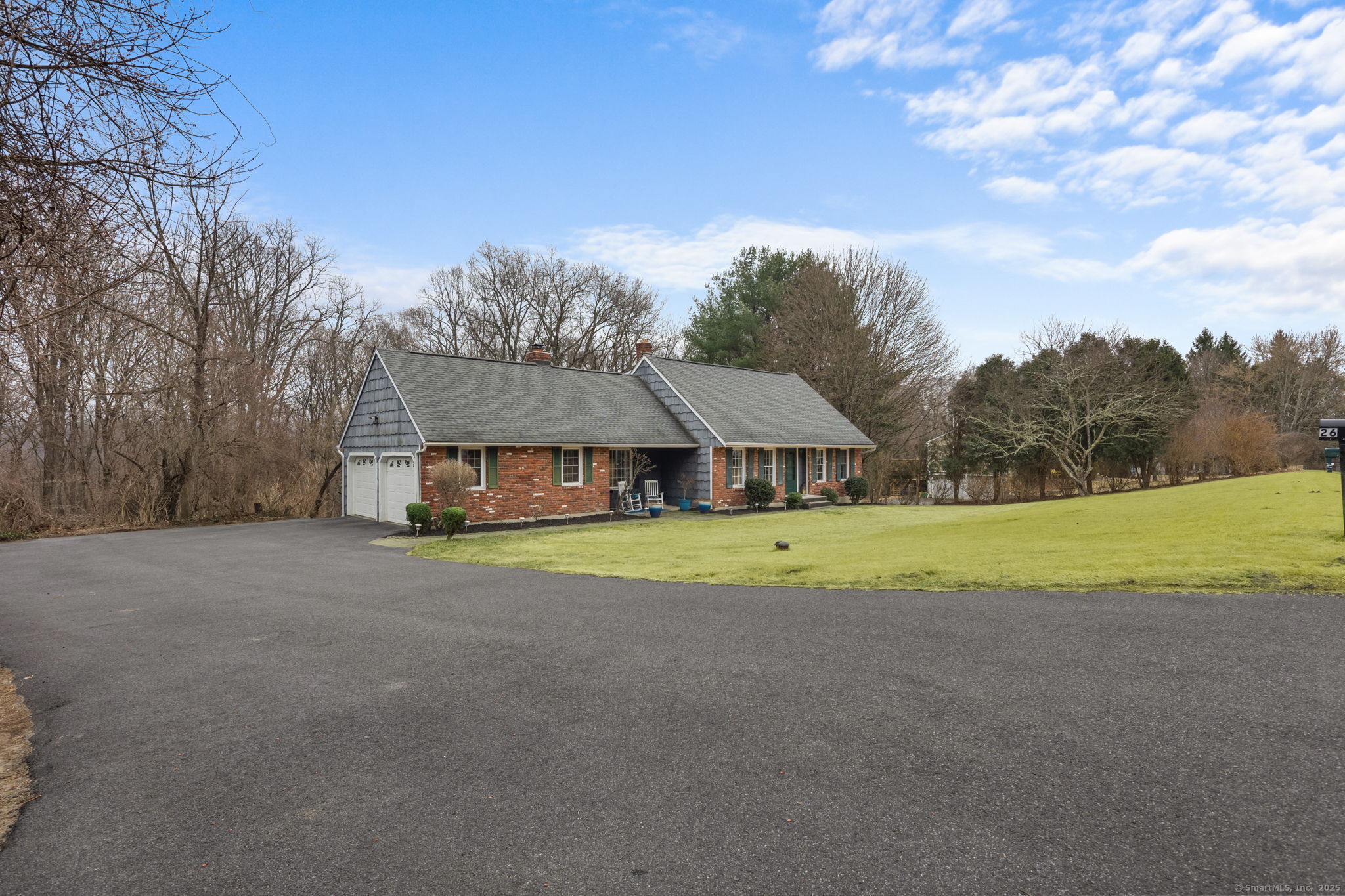 26 Bridle Road New Milford, CT 06776 - Photo 1 of 1 a view of a house with a yard and sitting area