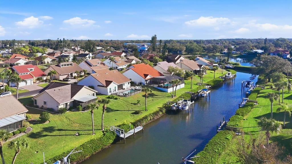139 Inlets Boulevard, Unit 139 Nokomis, FL 34275 - Photo 25 of 59 an aerial view of a house with a yard basket ball court and outdoor seating