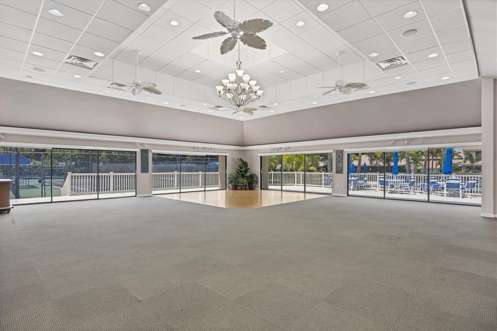 139 Inlets Boulevard, Unit 139 Nokomis, FL 34275 - Photo 44 of 59 a view of an empty room with a large window