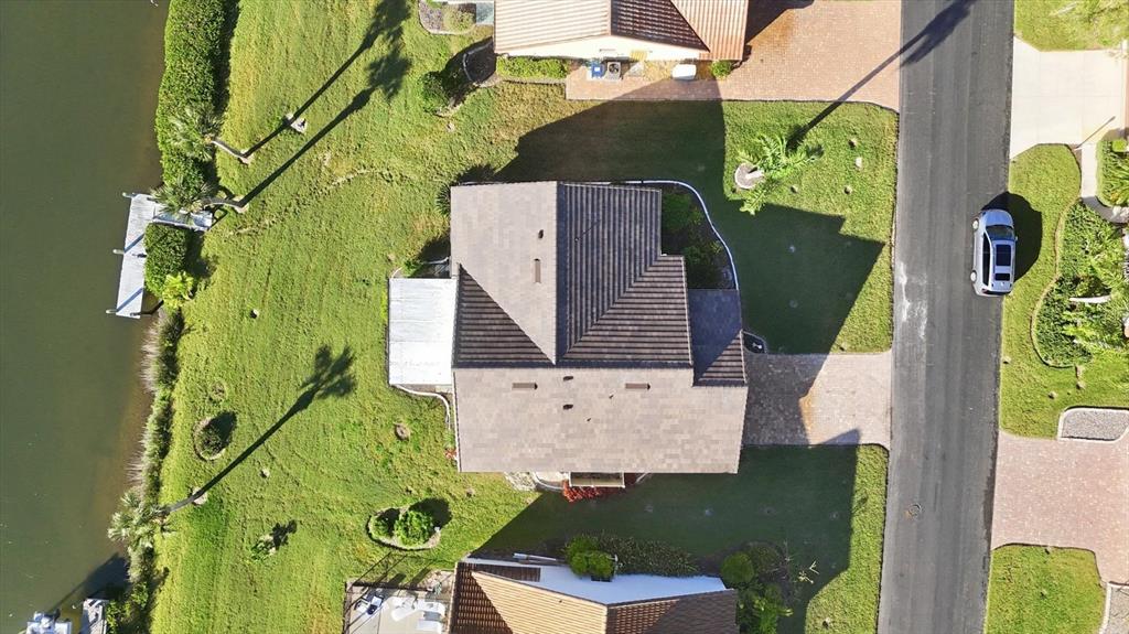 139 Inlets Boulevard, Unit 139 Nokomis, FL 34275 - Photo 52 of 59 an aerial view of a house with swimming pool