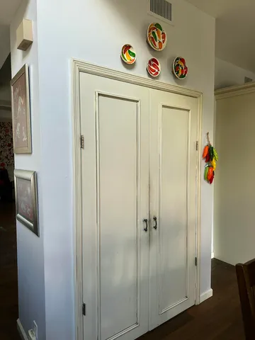 a room with furniture and wooden floor