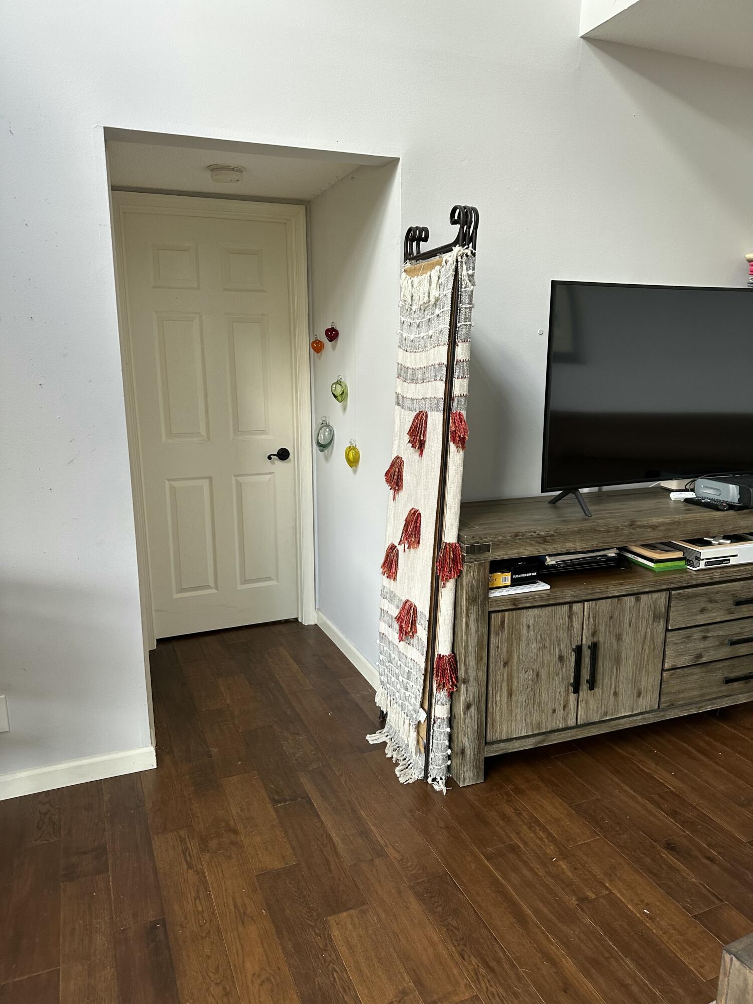 115 Spoonbill Court Jupiter, FL 33458 - Photo 18 of 52 a room with furniture and wooden floor