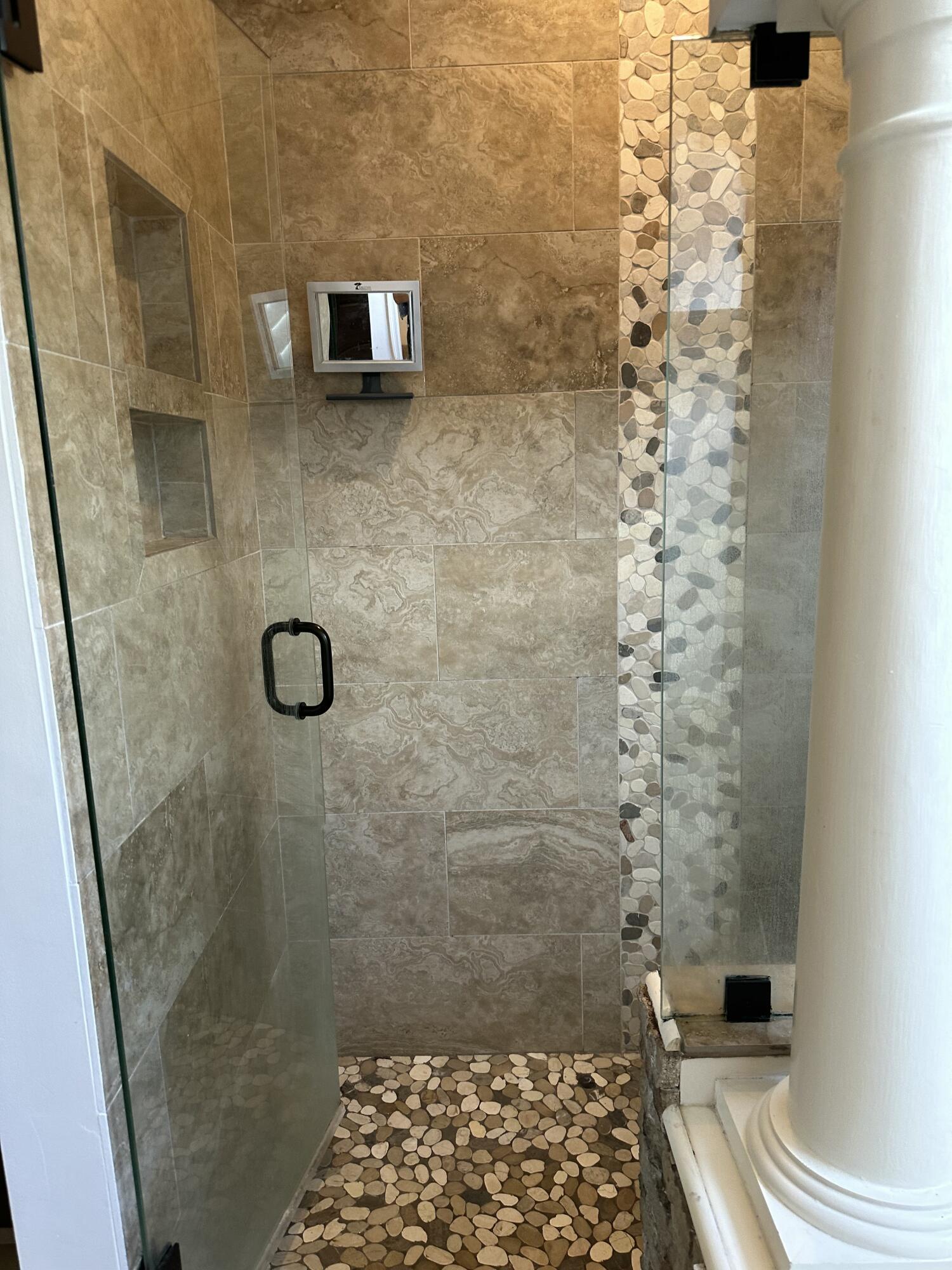115 Spoonbill Court Jupiter, FL 33458 - Photo 25 of 52 a bathroom with a shower