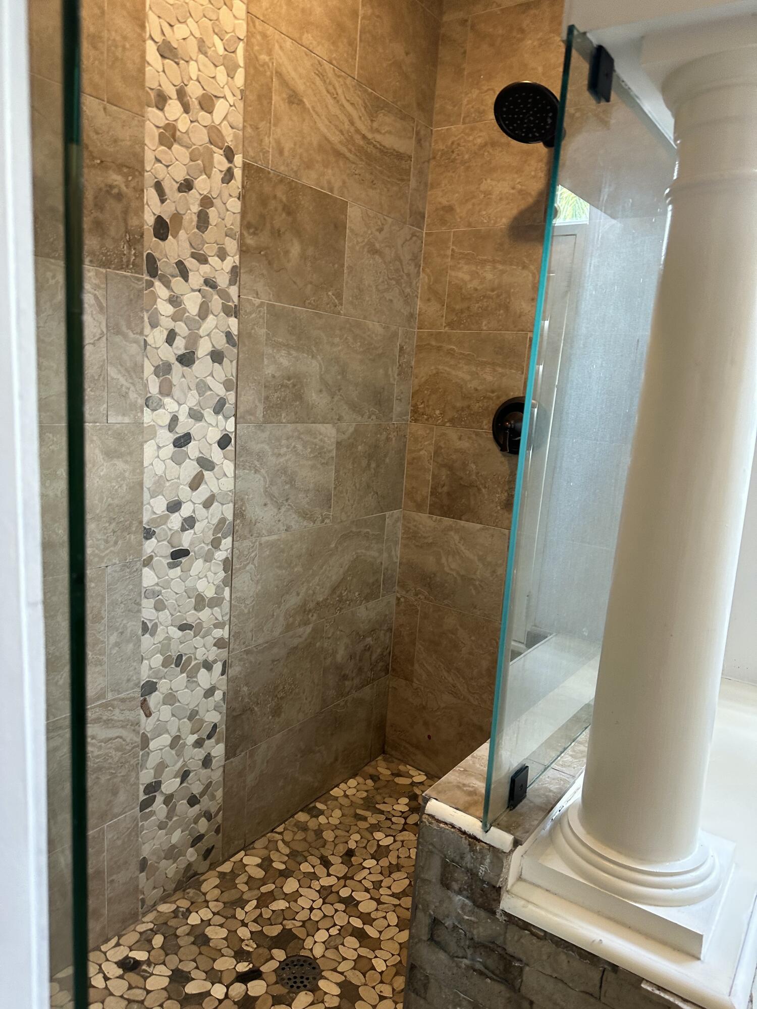 115 Spoonbill Court Jupiter, FL 33458 - Photo 26 of 52 a bathroom with a shower