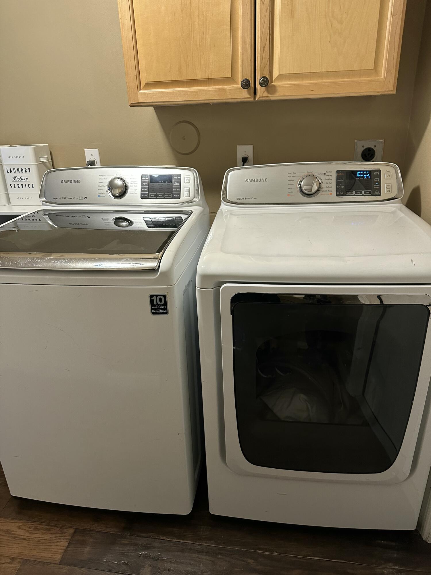 115 Spoonbill Court Jupiter, FL 33458 - Photo 40 of 52 a utility room with dryer and washer