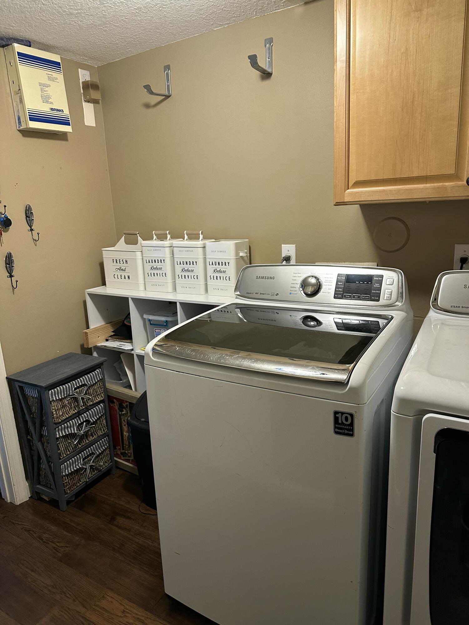 115 Spoonbill Court Jupiter, FL 33458 - Photo 41 of 52 a utility room with dryer and washer