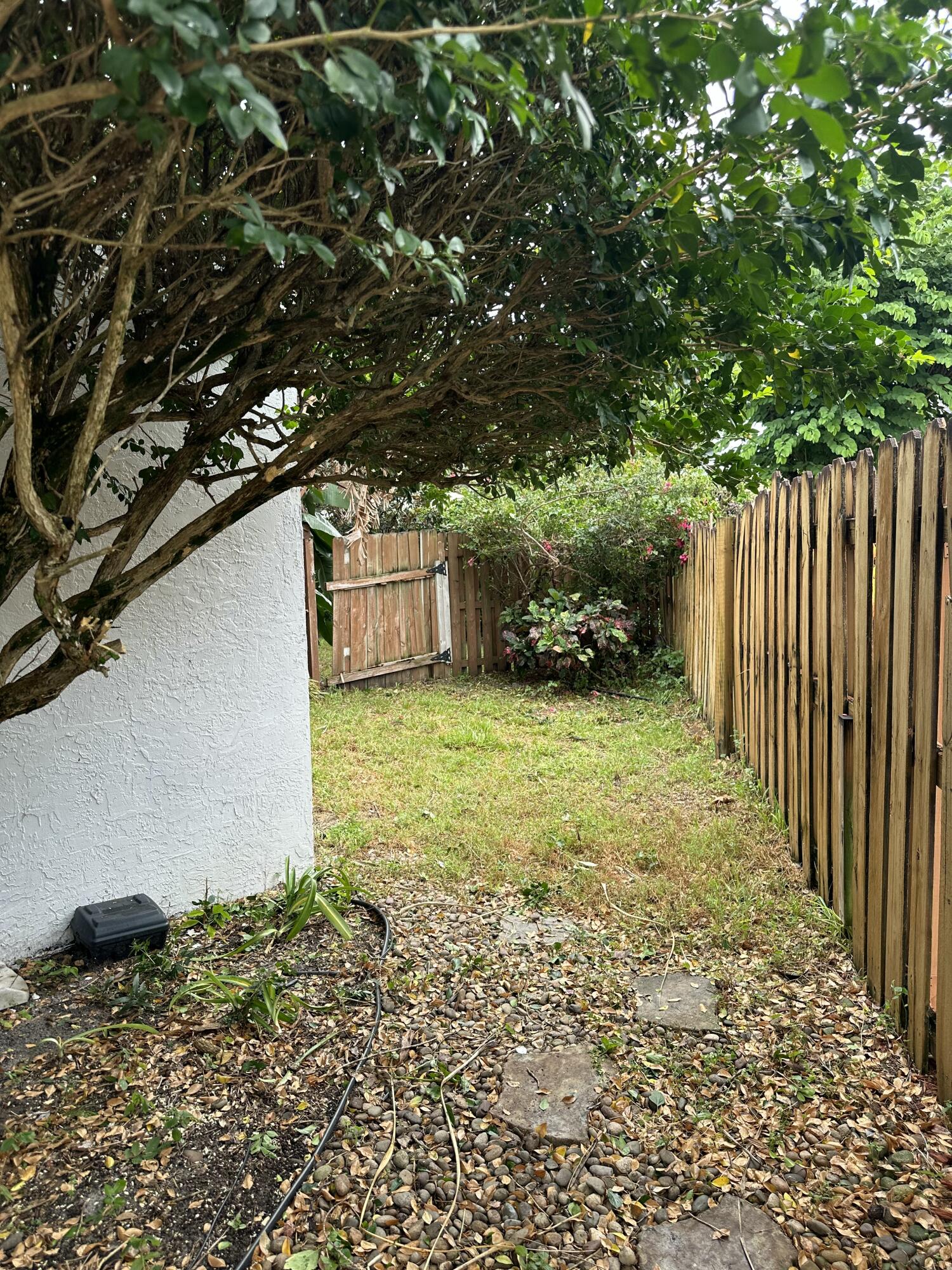 115 Spoonbill Court Jupiter, FL 33458 - Photo 48 of 52 a view of an outdoor space and yard