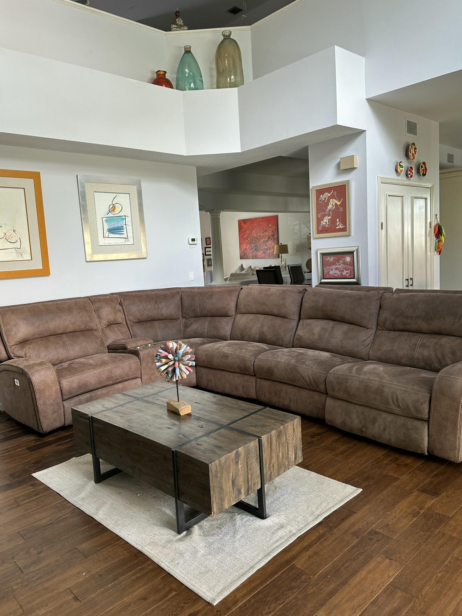 115 Spoonbill Court Jupiter, FL 33458 - Photo 9 of 52 a living room with furniture and a wooden floor