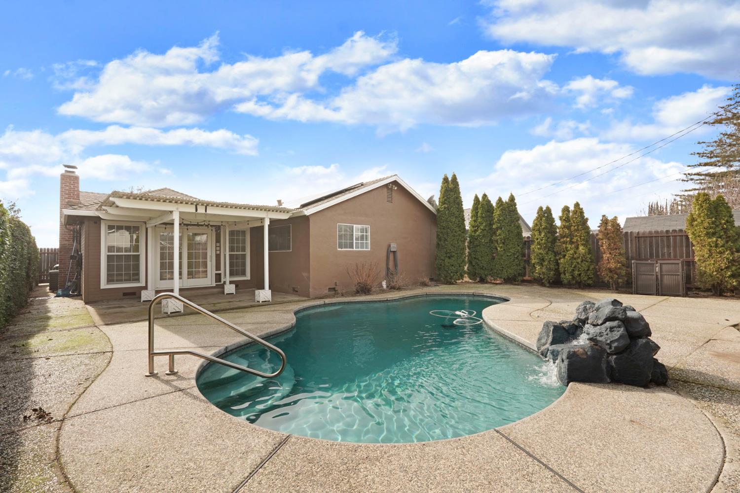 1525 West Vine Street Lodi, CA 95242 - Photo 31 of 36 a view of a house with backyard