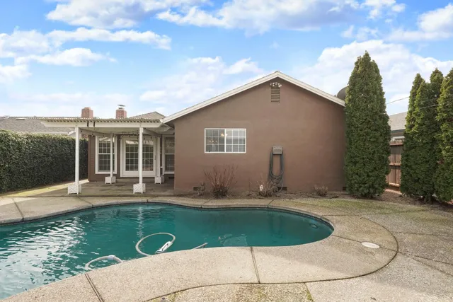 a house view with a garden space