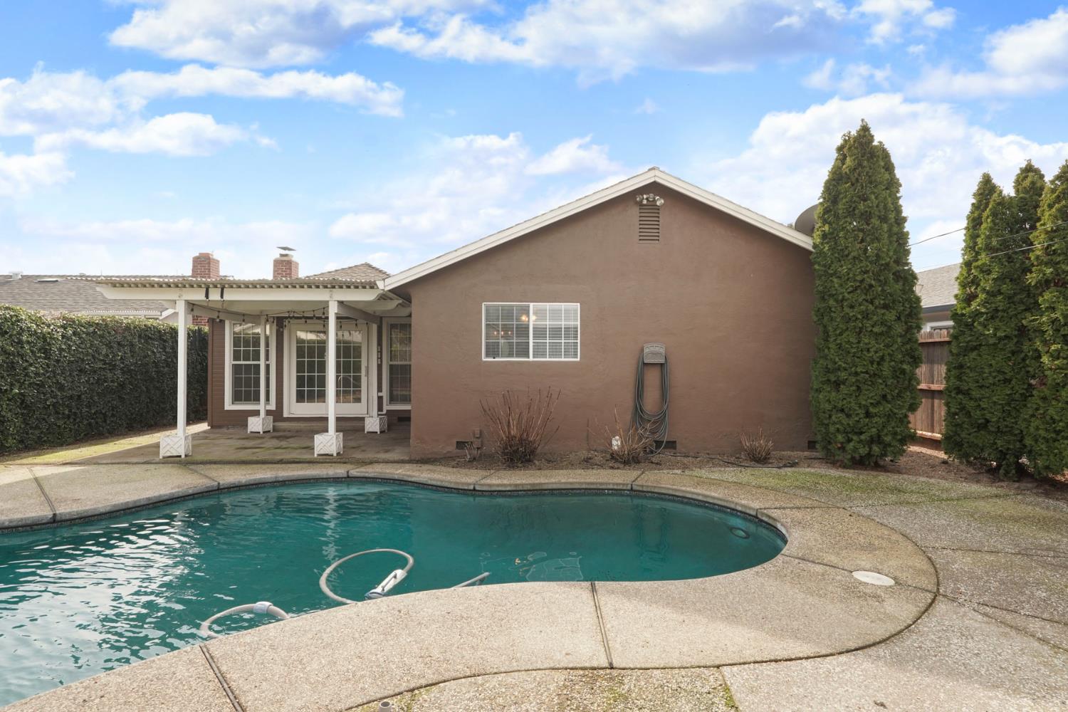 1525 West Vine Street Lodi, CA 95242 - Photo 34 of 36 a house view with a garden space