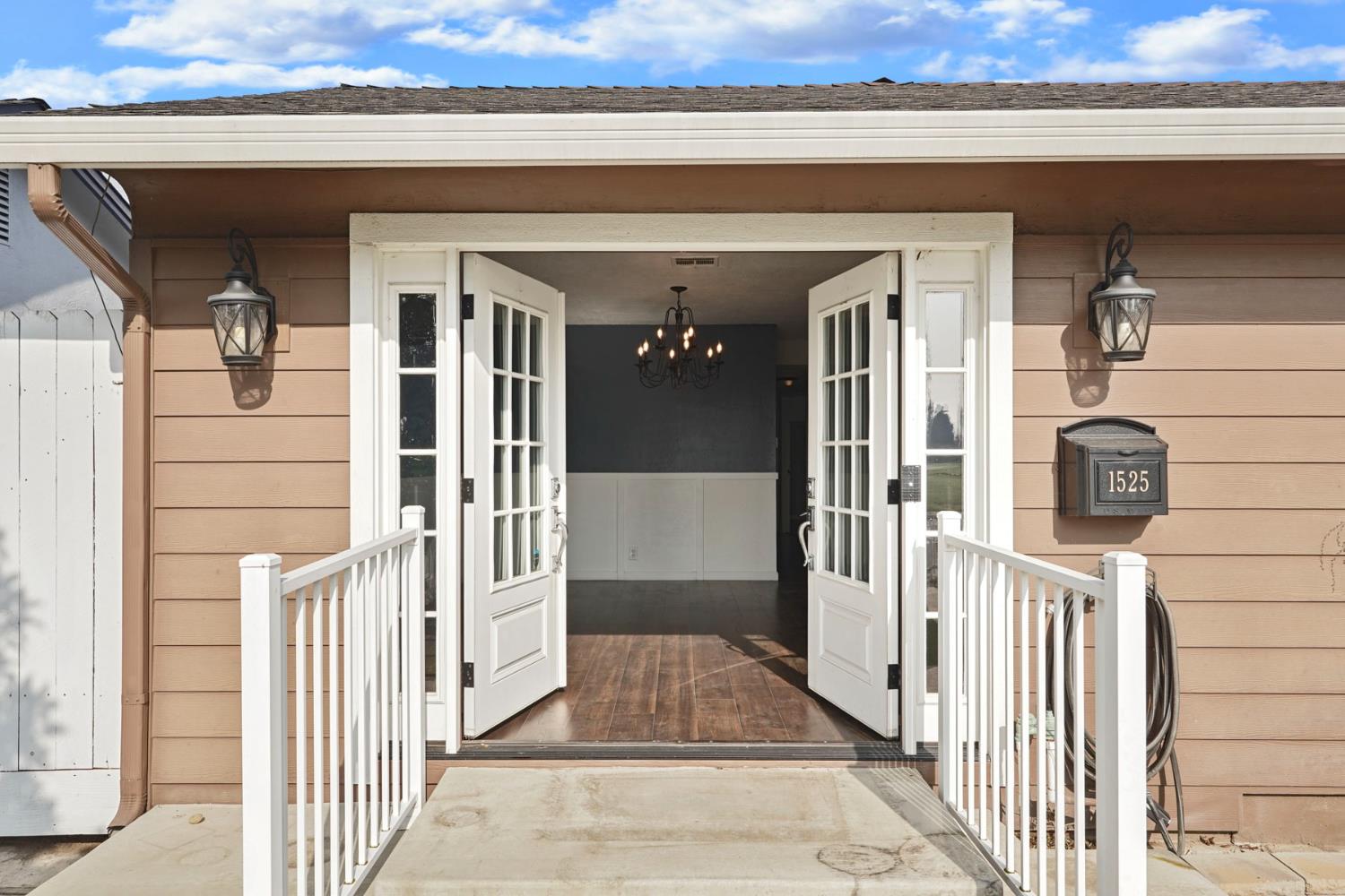 1525 West Vine Street Lodi, CA 95242 - Photo 7 of 36 a view of front door