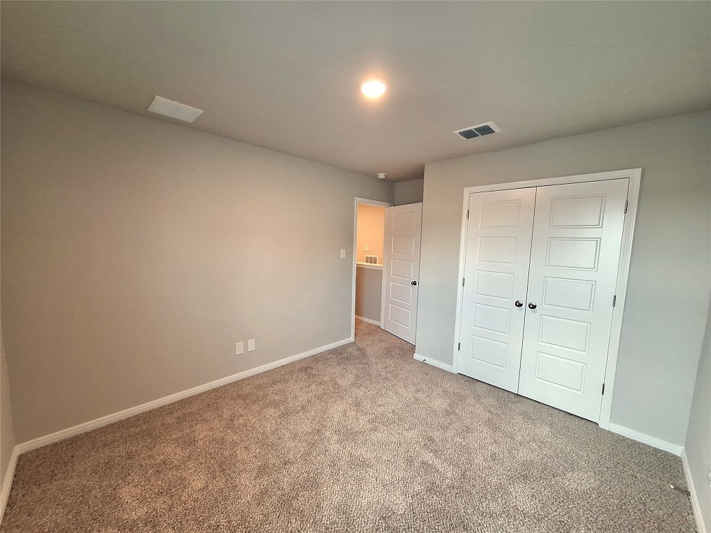 104 Gunner Road, Unit B Buda, TX 78610 - Photo 17 of 22 a view of an empty room