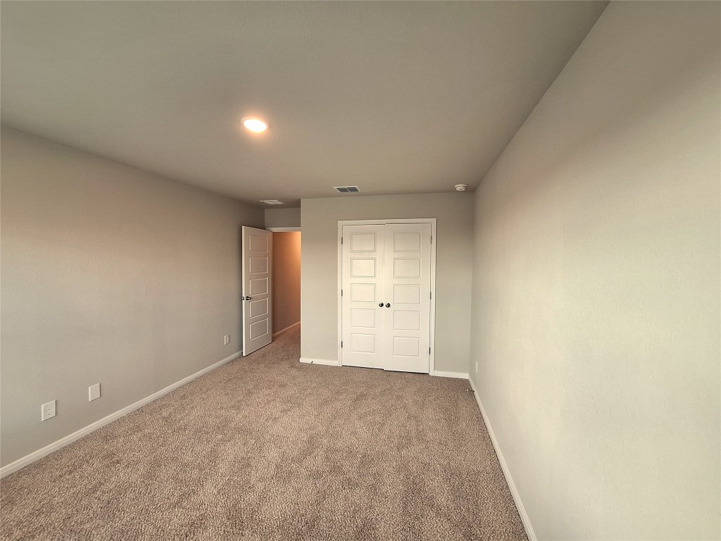 104 Gunner Road, Unit B Buda, TX 78610 - Photo 20 of 22 a view of an empty room