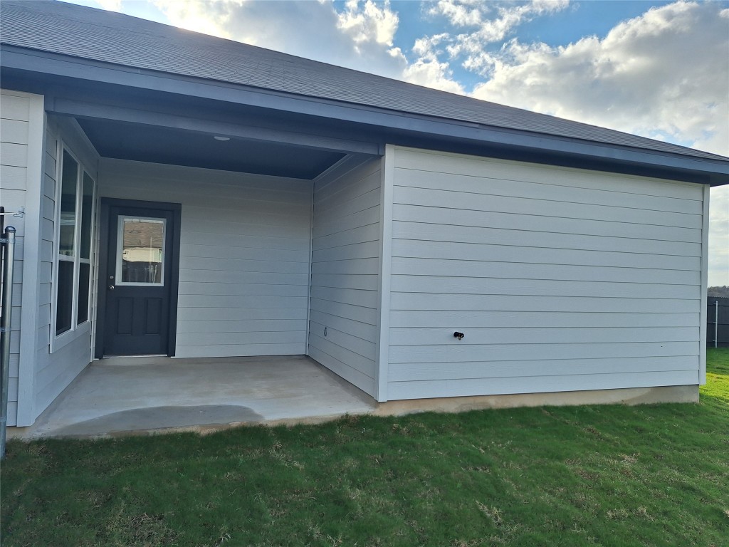 104 Gunner Road, Unit B Buda, TX 78610 - Photo 22 of 22 a view of an entrance to house