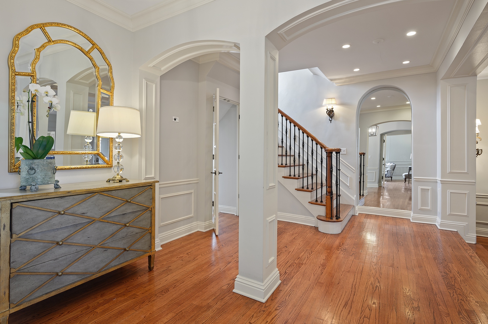 1435 Tower Road Winnetka, IL 60093 - Photo 2 of 34 a view of entryway and hall with wooden floor