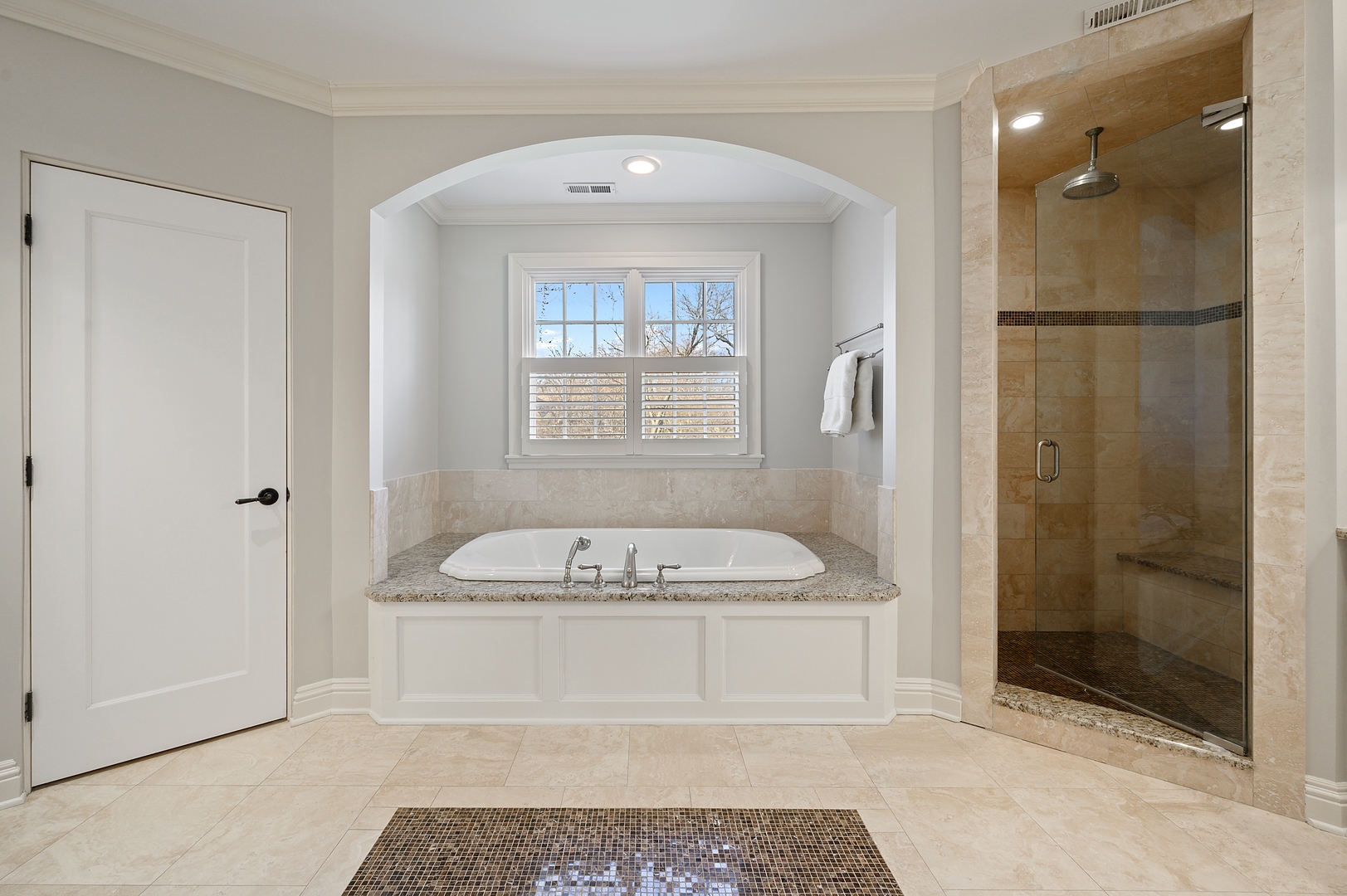 1435 Tower Road Winnetka, IL 60093 - Photo 25 of 34 a bathroom with a sink a toilet and shower