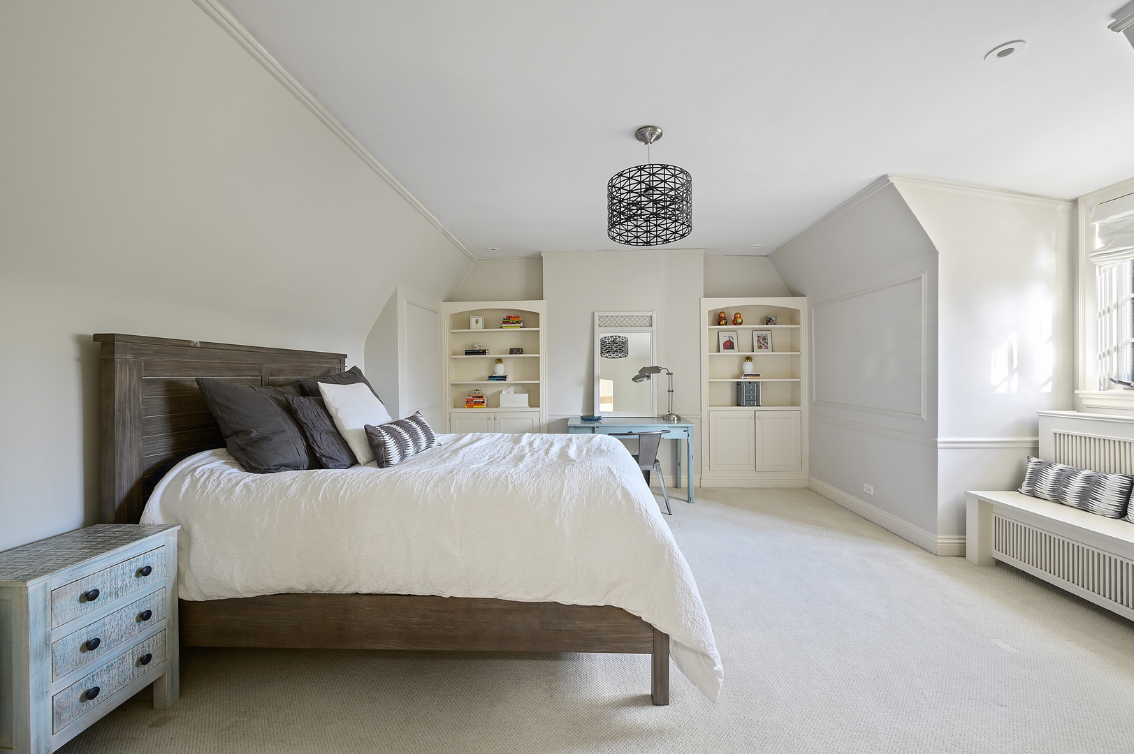 1435 Tower Road Winnetka, IL 60093 - Photo 27 of 34 a bedroom with a bed and a chandelier