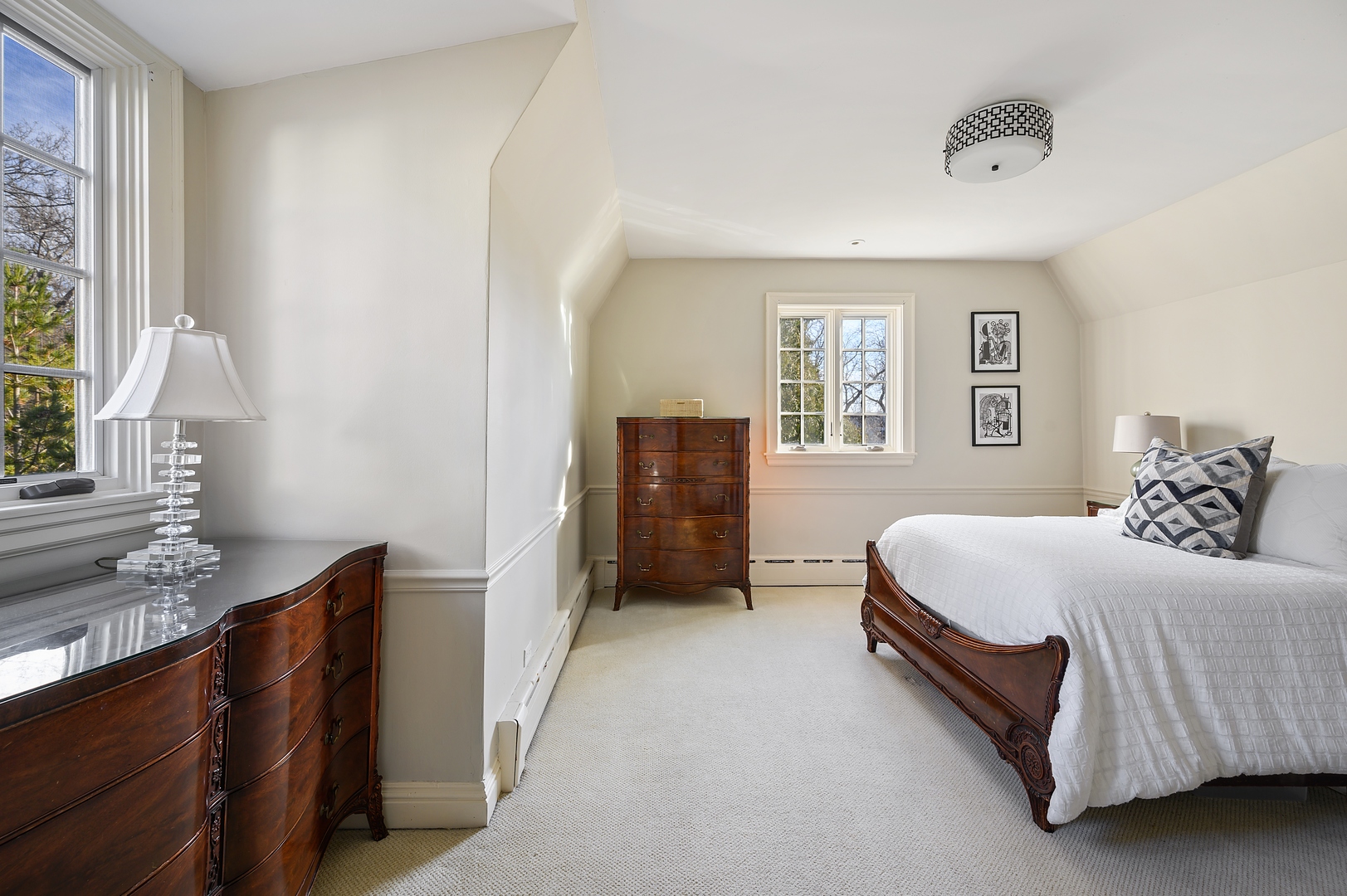 1435 Tower Road Winnetka, IL 60093 - Photo 28 of 34 a spacious bedroom with a bed and a window