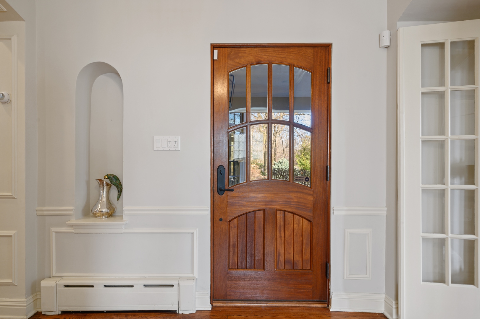1435 Tower Road Winnetka, IL 60093 - Photo 33 of 34 a bathroom with a sink and a mirror