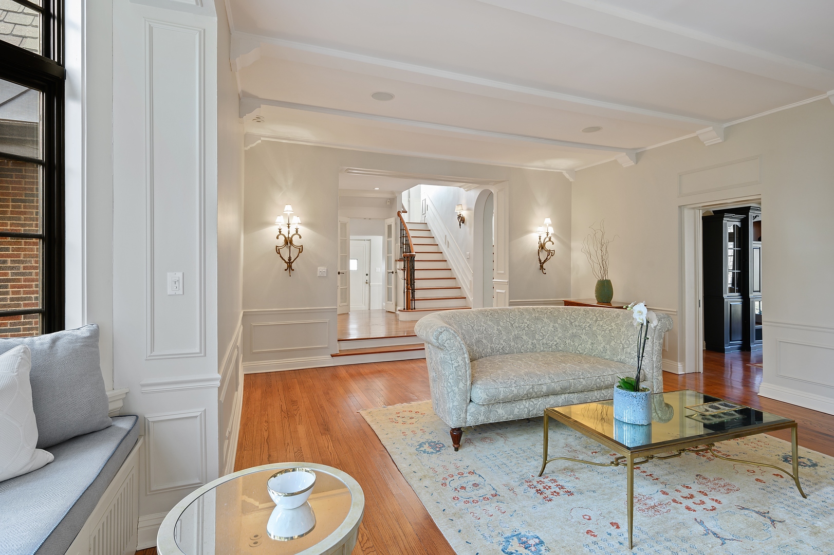 1435 Tower Road Winnetka, IL 60093 - Photo 9 of 34 a living room with furniture and a wooden floor