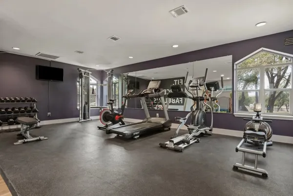 a view of a room with gym equipment