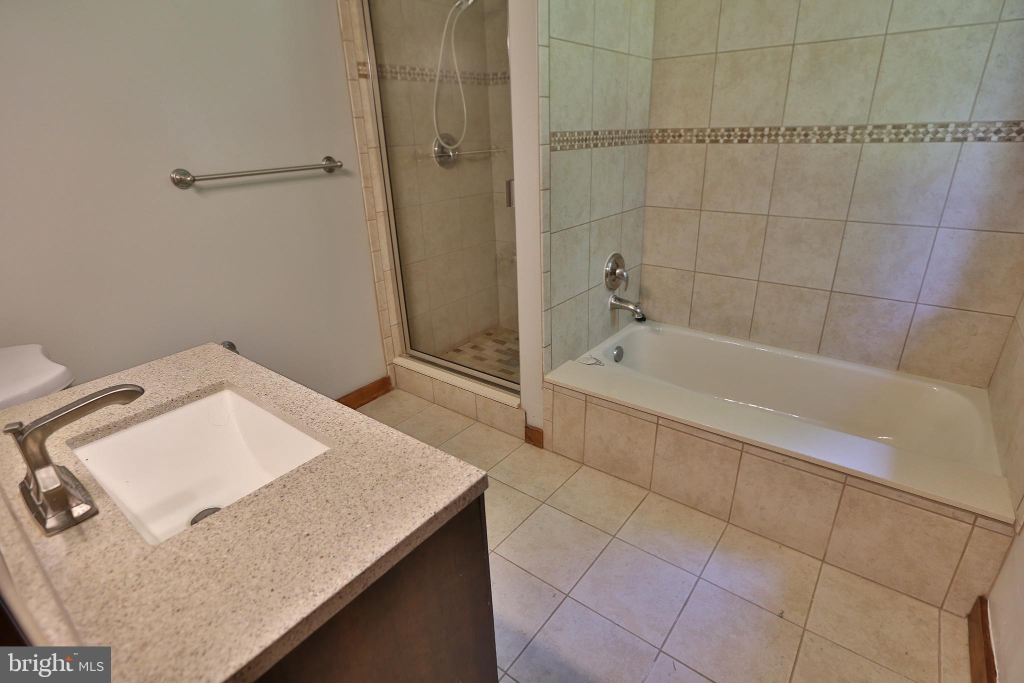 7247 Clifton Road Clifton, VA 20124 - Photo 21 of 38 Primary Bath w/Tub in Main Level