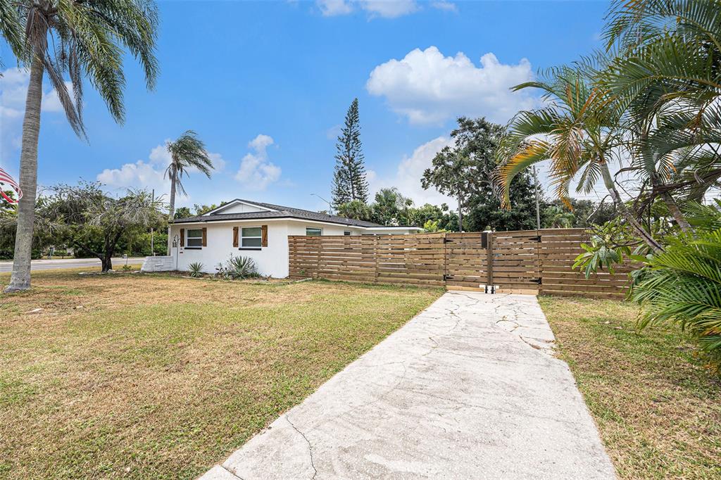 1806 North Keene Road Clearwater, FL 33755 - Photo 30 of 35 a bathroom with a sink and a mirror