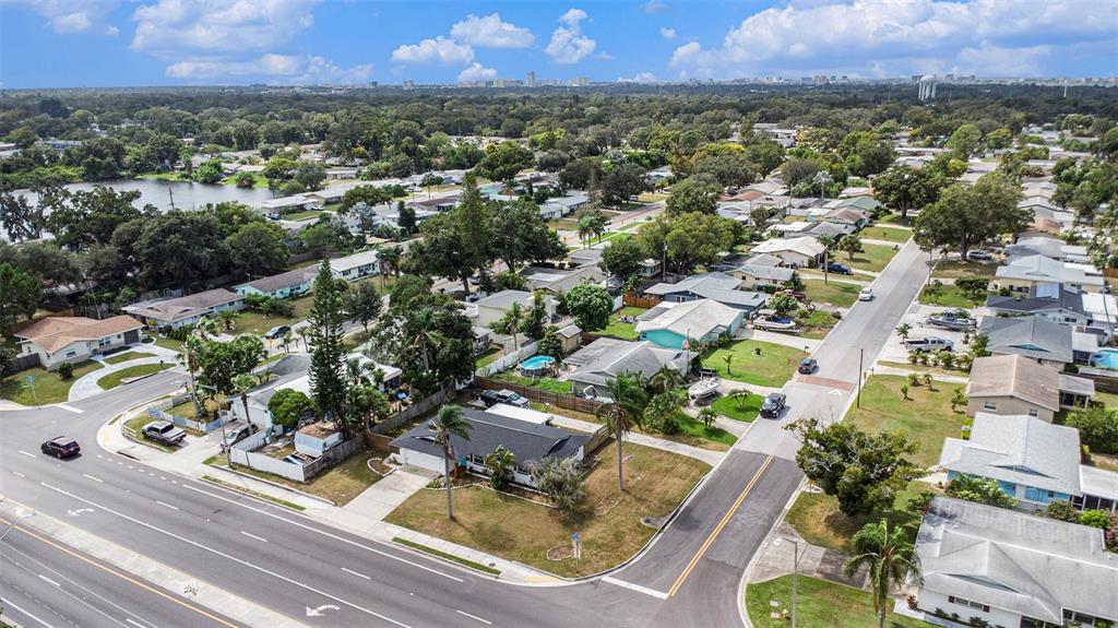 1806 North Keene Road Clearwater, FL 33755 - Photo 34 of 35 an aerial view of residential houses with outdoor space and trees