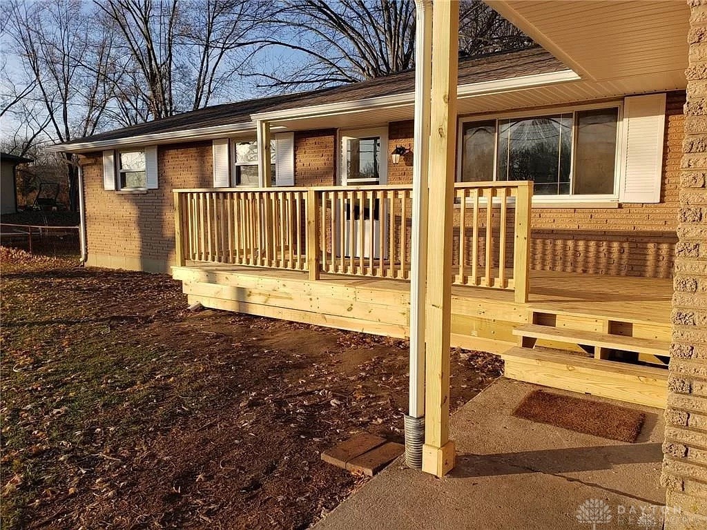 7777 Singer Road Dayton, OH 45424 - Photo 3 of 22 Front porch before stained