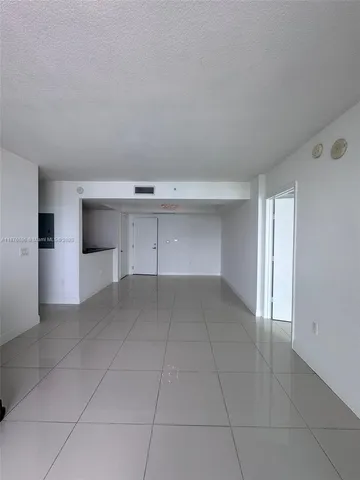 a view of a city with tall buildings