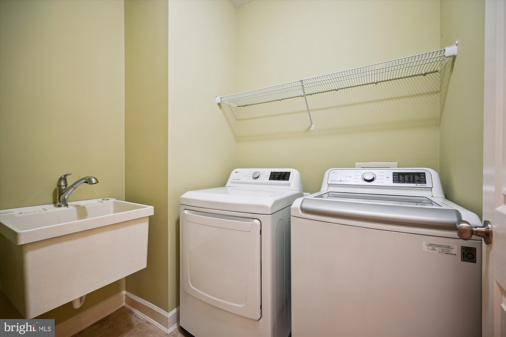 7321 Brink Road Laytonsville, MD 20882 - Photo 30 of 55 a utility room with dryer and washer