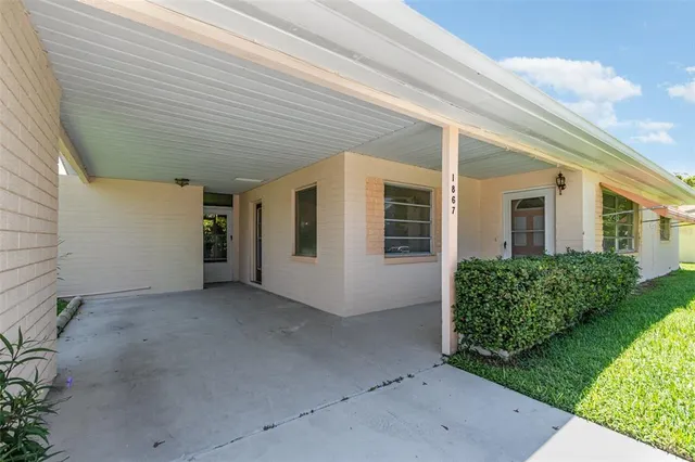 a view of a back yard of the house